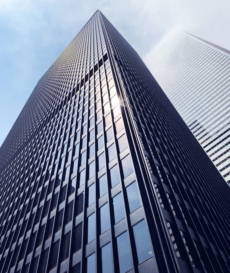 Financial district skyscraper viewed from below