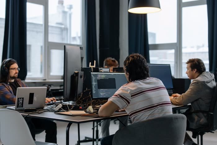 Development team working together at their desks