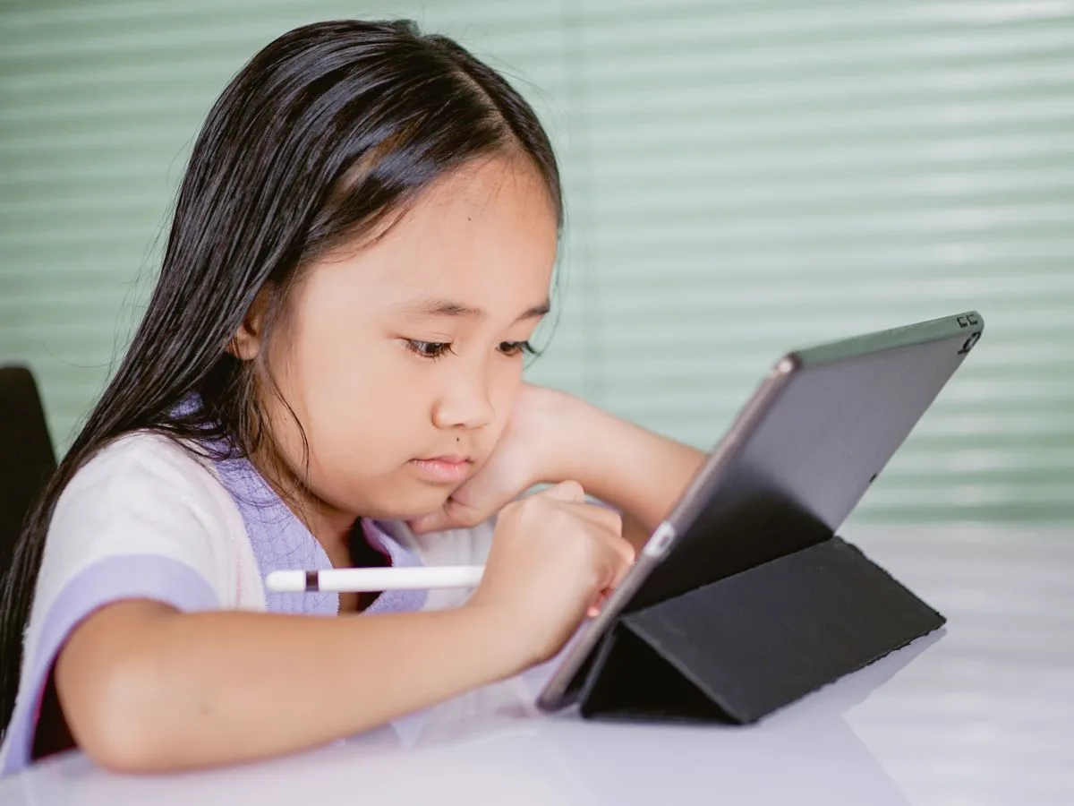 Student using a tablet for schoolwork